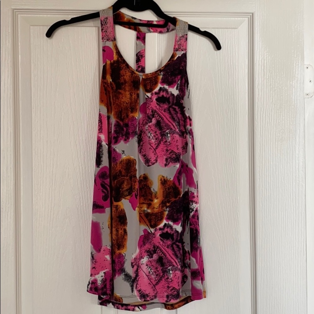 The limited sleeveless blouse. Size S.